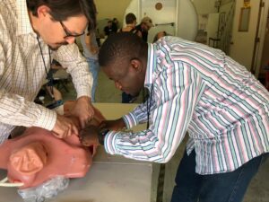 Medical staff assisting a patient at Holistic Care Medicals