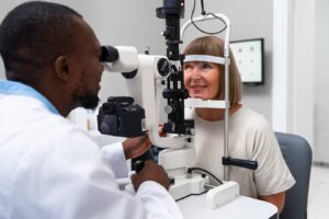 Ophthalmologist consulting a patient at Holistic Care Medicals